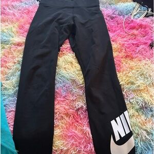 Nike women’s size S. black leggings with white Nike logo